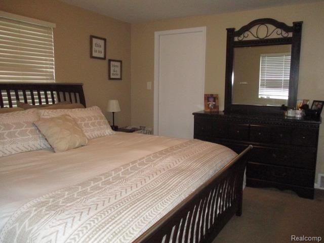 1403 Highland Road Highland, MI 48357 - Photo 12 of 18 1403 Highland bedroom closet.jpg