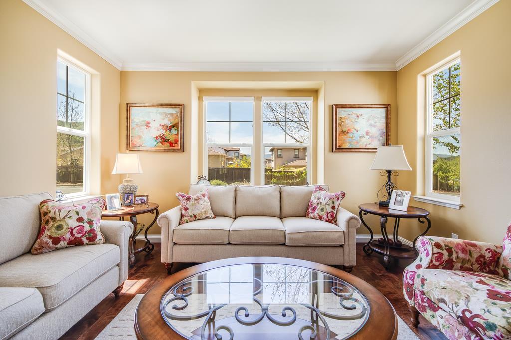 7670 MacKenzie Way Gilroy, CA 95020 - Photo 12 of 70 a living room with furniture and a window