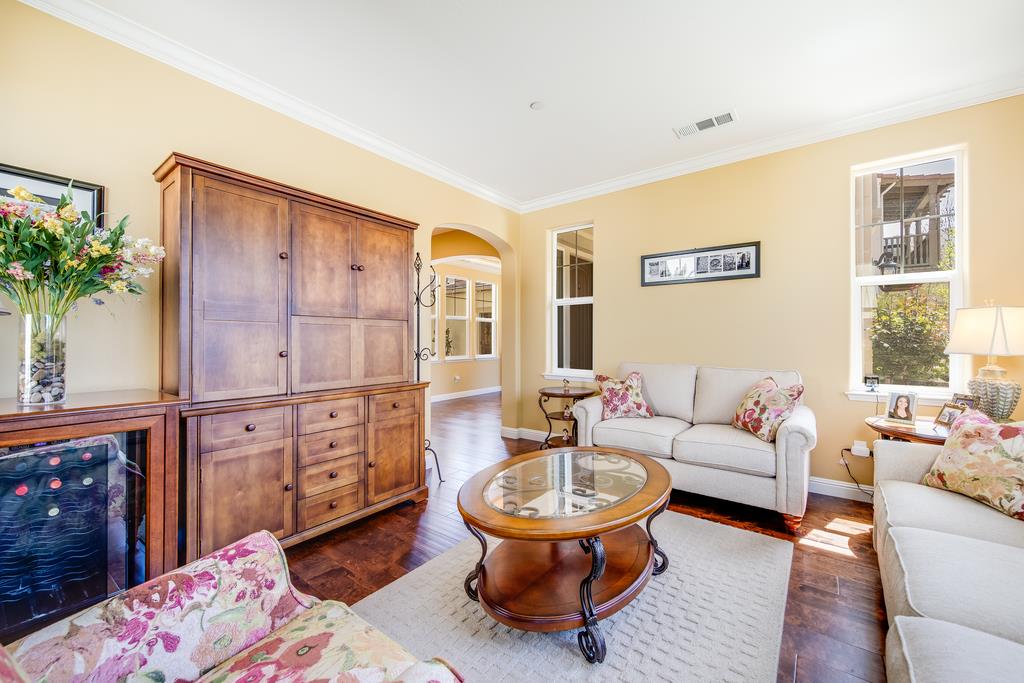 7670 MacKenzie Way Gilroy, CA 95020 - Photo 13 of 70 a living room with furniture and a potted plant