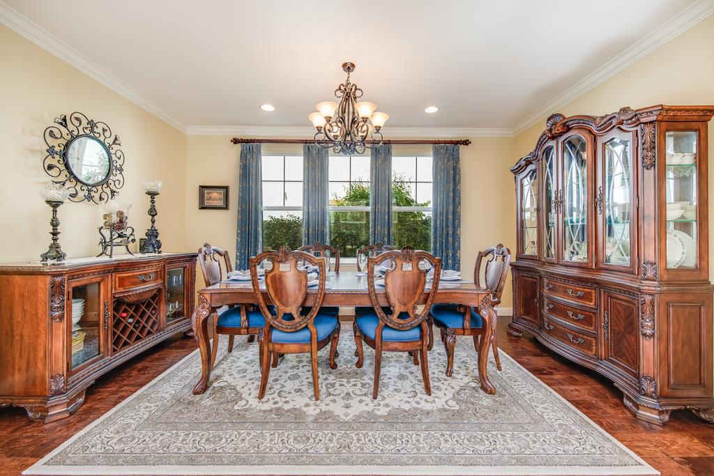 7670 MacKenzie Way Gilroy, CA 95020 - Photo 15 of 70 a view of a dining room with furniture window and wooden floor
