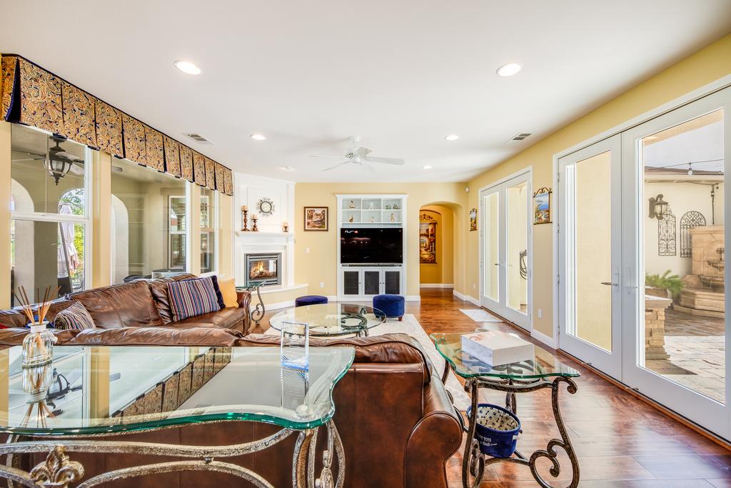 7670 MacKenzie Way Gilroy, CA 95020 - Photo 20 of 70 a living room with furniture and a flat screen tv