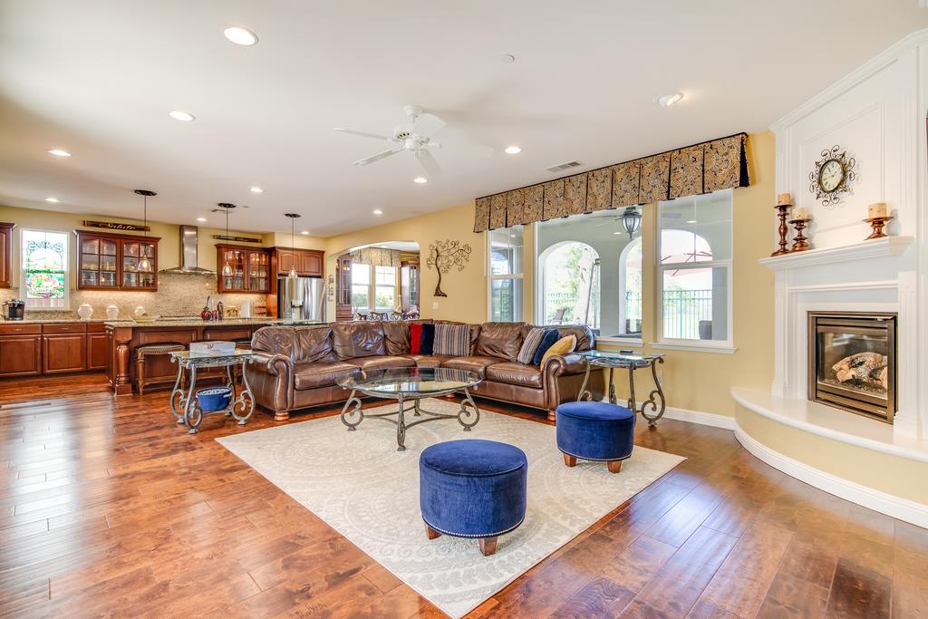 7670 MacKenzie Way Gilroy, CA 95020 - Photo 21 of 70 a living room with furniture and a fireplace