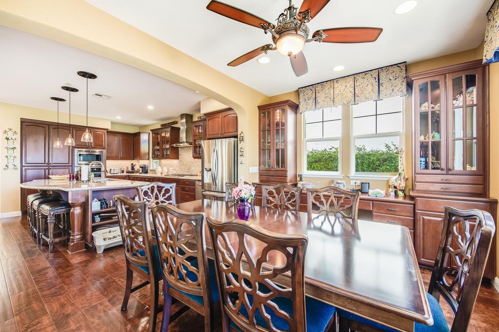 7670 MacKenzie Way Gilroy, CA 95020 - Photo 30 of 70 a view of a dining room with furniture window and outside view