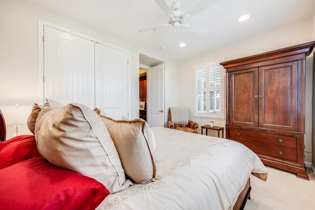 7670 MacKenzie Way Gilroy, CA 95020 - Photo 33 of 70 a bedroom with a bed and wooden floor