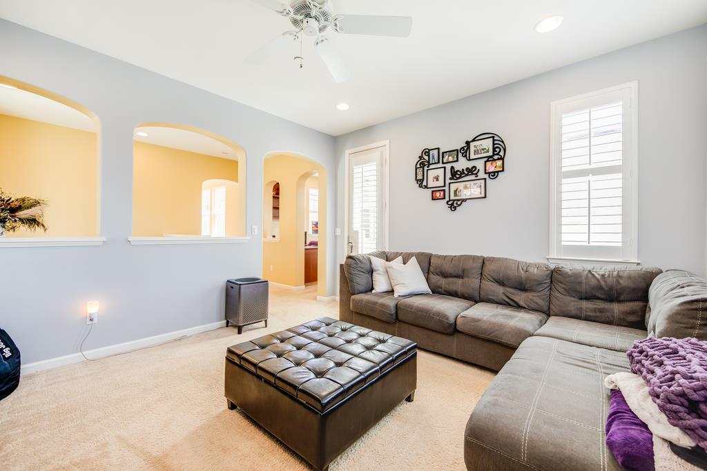 7670 MacKenzie Way Gilroy, CA 95020 - Photo 37 of 70 a living room with furniture and a window