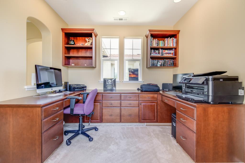 7670 MacKenzie Way Gilroy, CA 95020 - Photo 39 of 70 a kitchen with stainless steel appliances granite countertop a sink and cabinets
