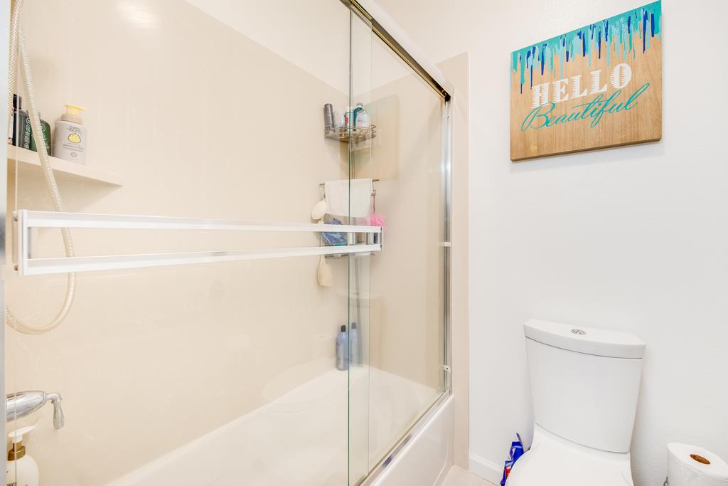 7670 MacKenzie Way Gilroy, CA 95020 - Photo 46 of 70 a bathroom with a bathtub and a shower