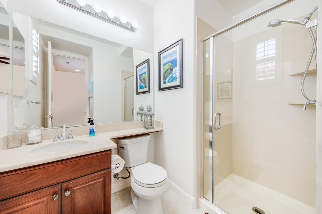7670 MacKenzie Way Gilroy, CA 95020 - Photo 59 of 70 a bathroom with a sink toilet and shower