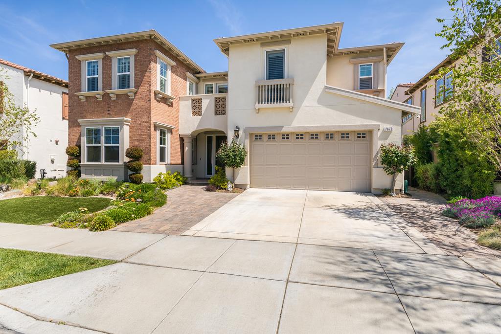 7670 MacKenzie Way Gilroy, CA 95020 - Photo 9 of 70 a front view of a house with garden