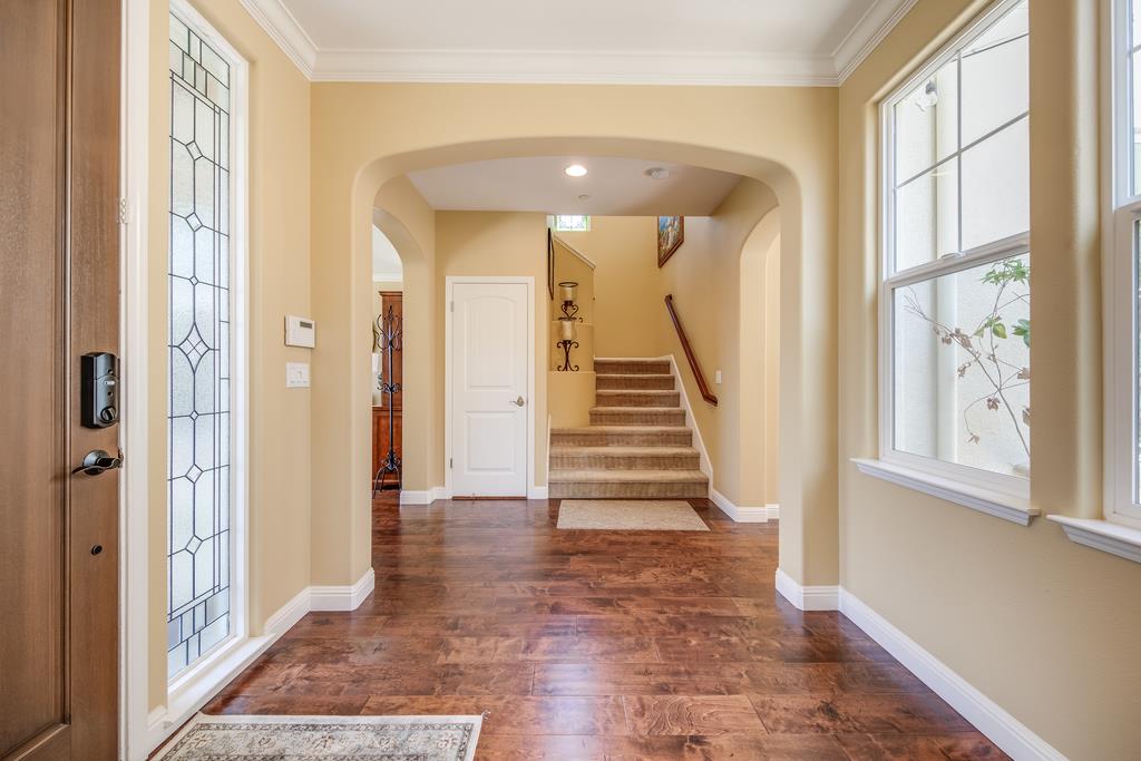 7670 MacKenzie Way Gilroy, CA 95020 - Photo 10 of 70 a view of entryway with wooden floor and stair