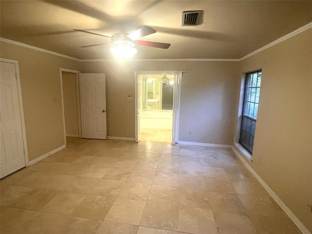 720 Coachlight Road Shreveport, LA 71106 - Photo 15 of 22 a view of an empty room with glass door