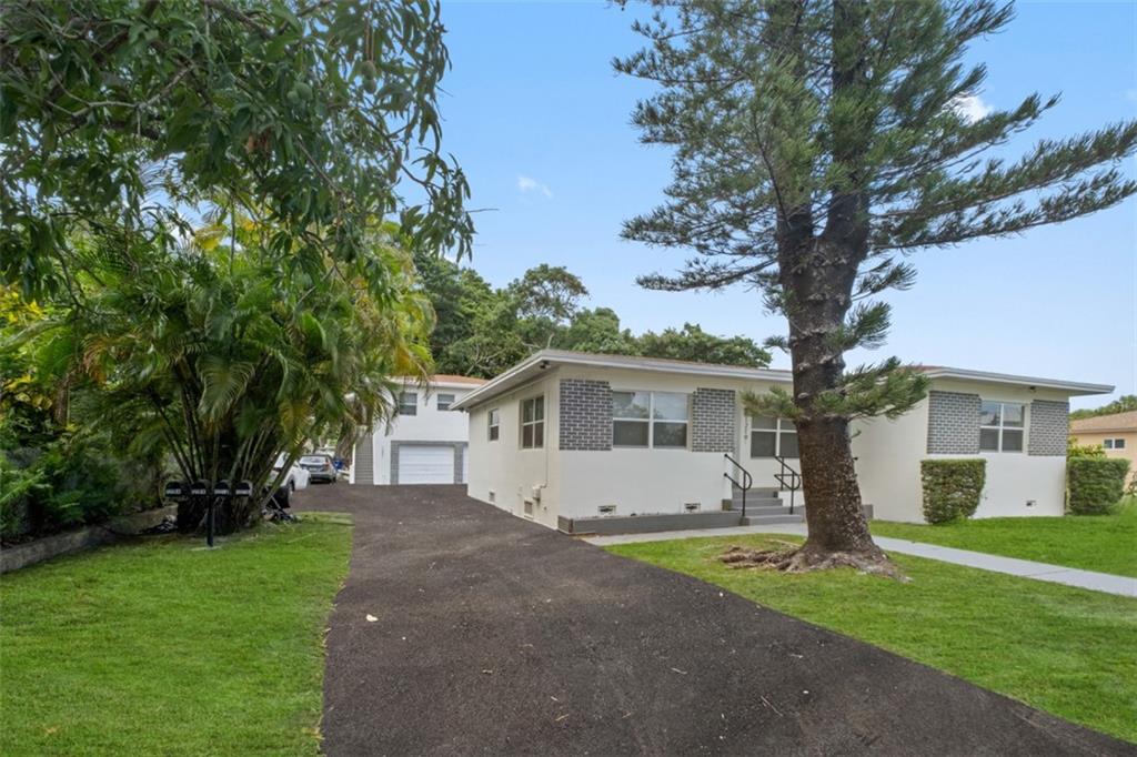 front view of house with a yard