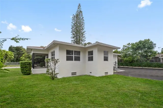 a house view with a garden space