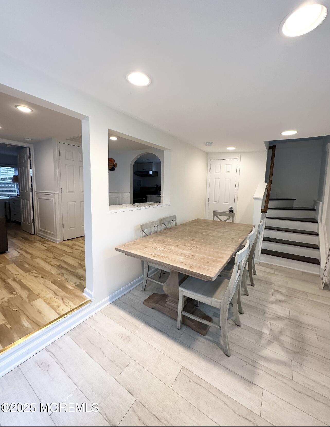 7 Princeton Avenue Lavallette, NJ 08735 - Photo 3 of 17 a living room with a table and chairs in it