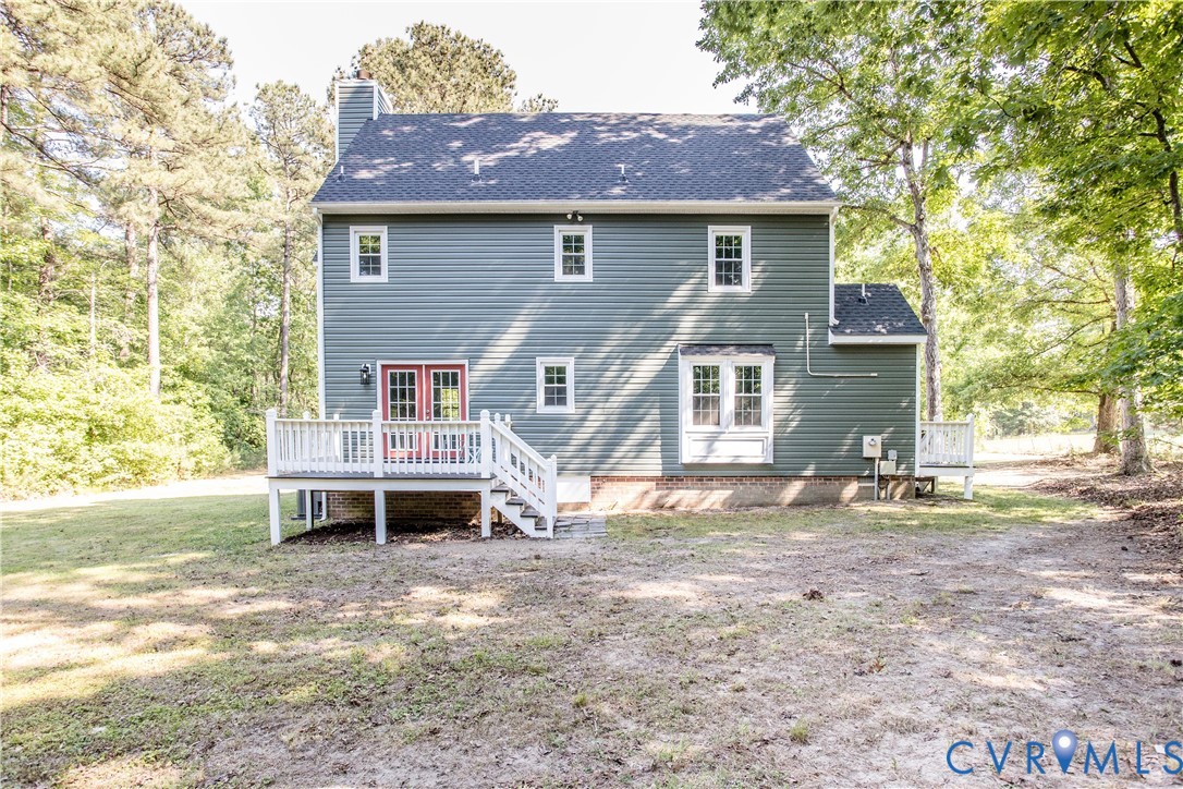 13110 Hensley Road Midlothian, VA 23112 - Photo 4 of 24 a backyard of a house with table and chairs