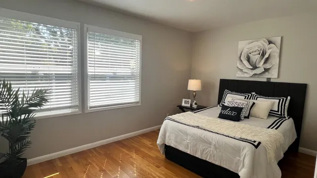 a living room with furniture fireplace and window