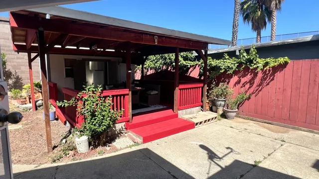a view of a house with a street