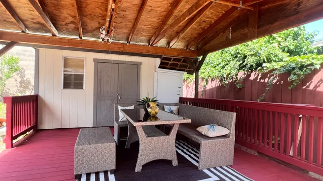 a kitchen with stainless steel appliances granite countertop a stove a sink and dishwasher