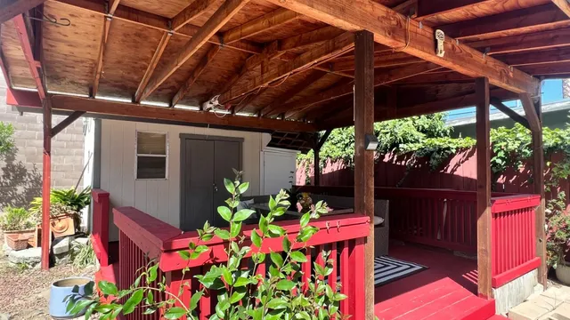 a view of a backyard of the house