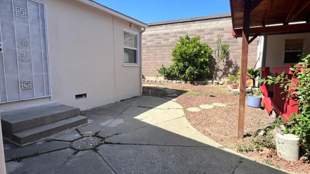 a view of a house with garden