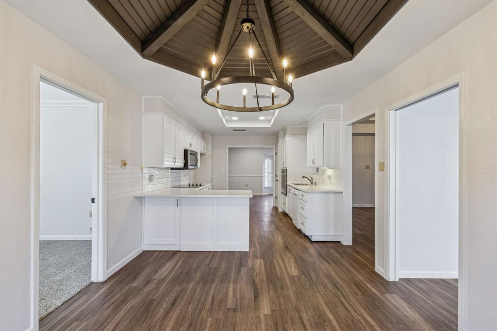 608 Knightsbridge Road Willow Park, TX 76087 - Photo 13 of 31 a kitchen with a hard wood floor