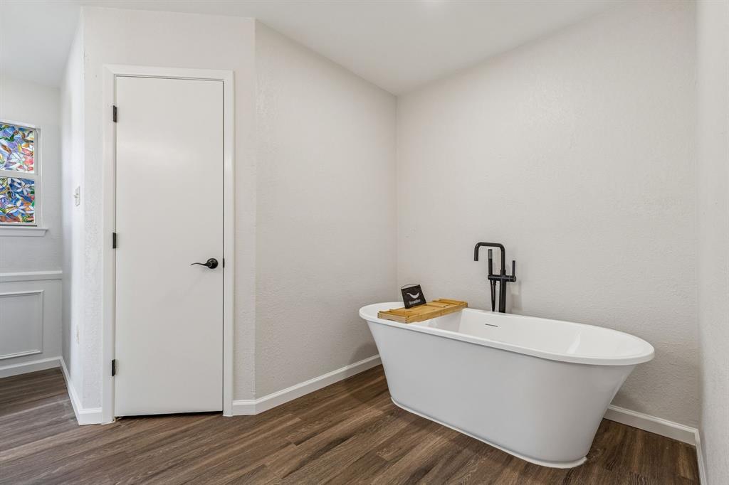 608 Knightsbridge Road Willow Park, TX 76087 - Photo 18 of 31 a view of a room with a sink and mirror