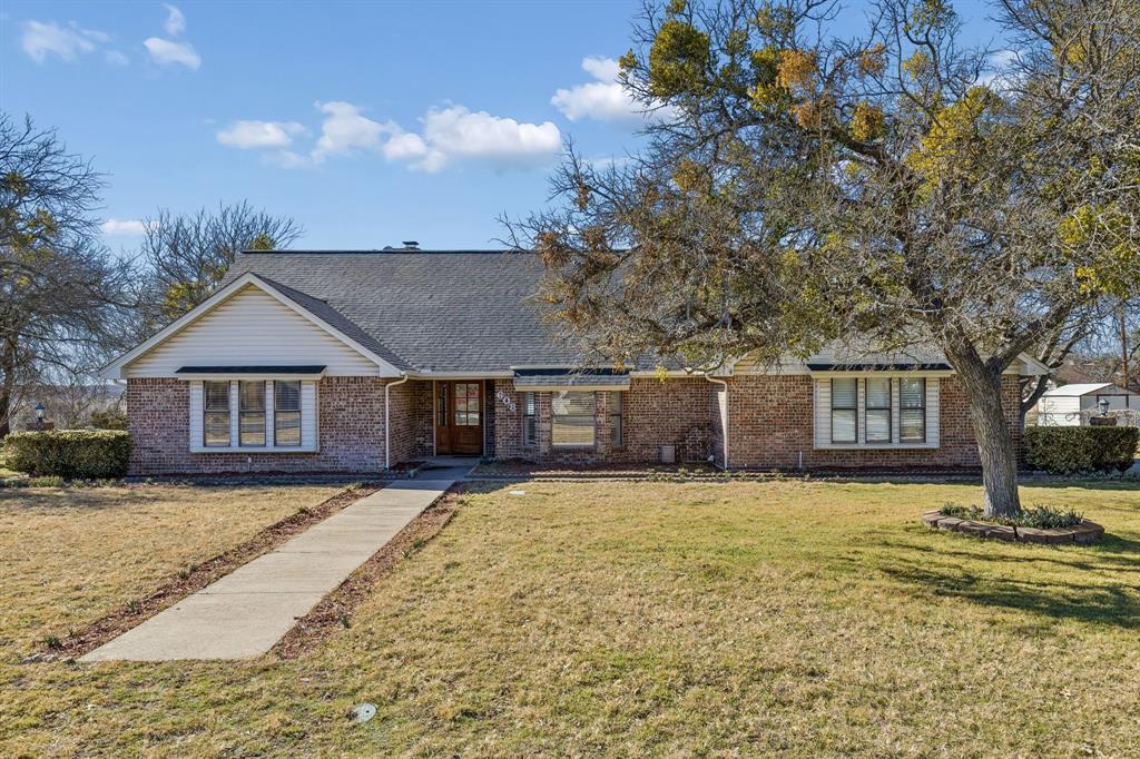 608 Knightsbridge Road Willow Park, TX 76087 - Photo 2 of 31 a front view of a house with yard and trees