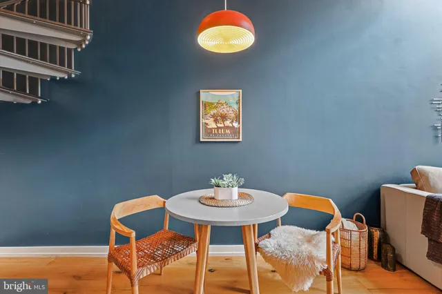 a table and chairs in a room