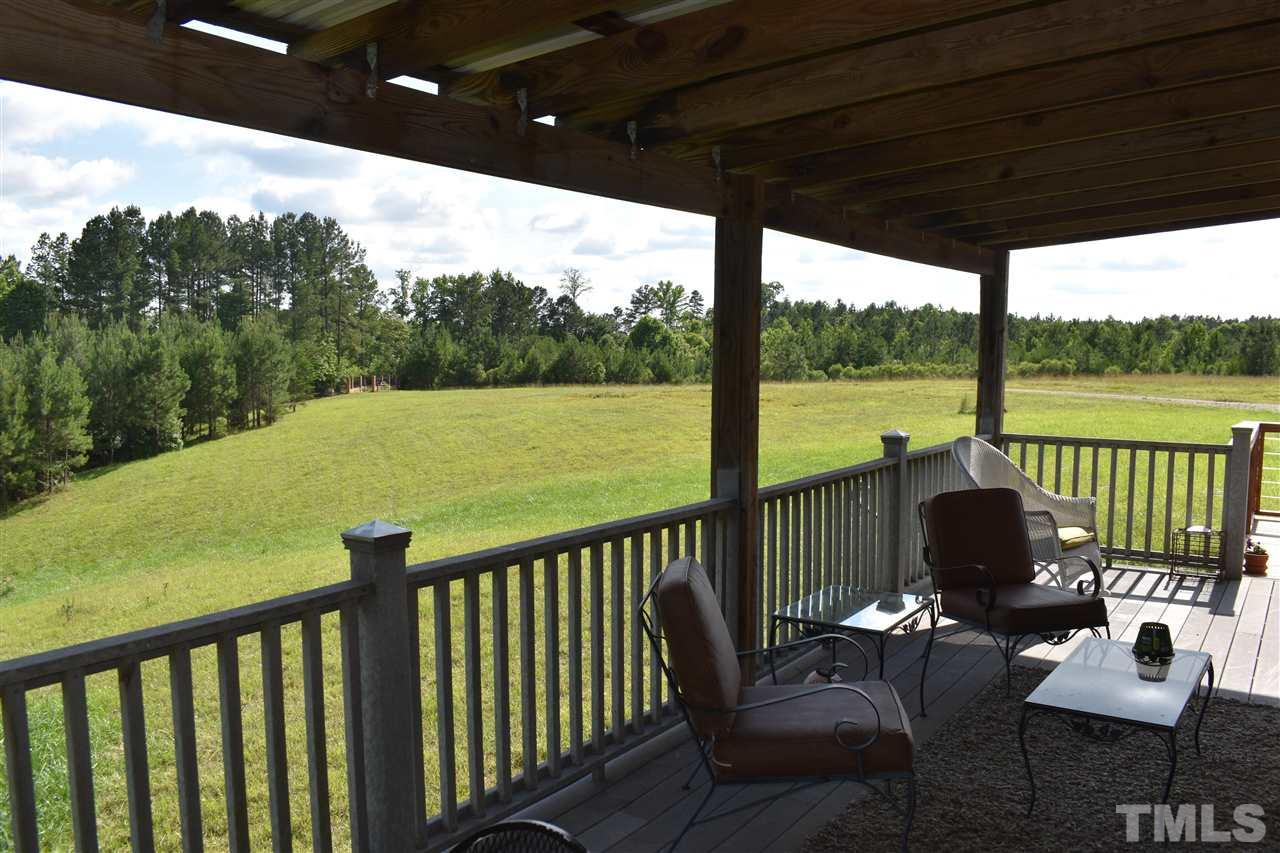 466 Vineyard Ridge Siler City, NC 27344 - Photo 2 of 29 a view of a two chairs in the balcony