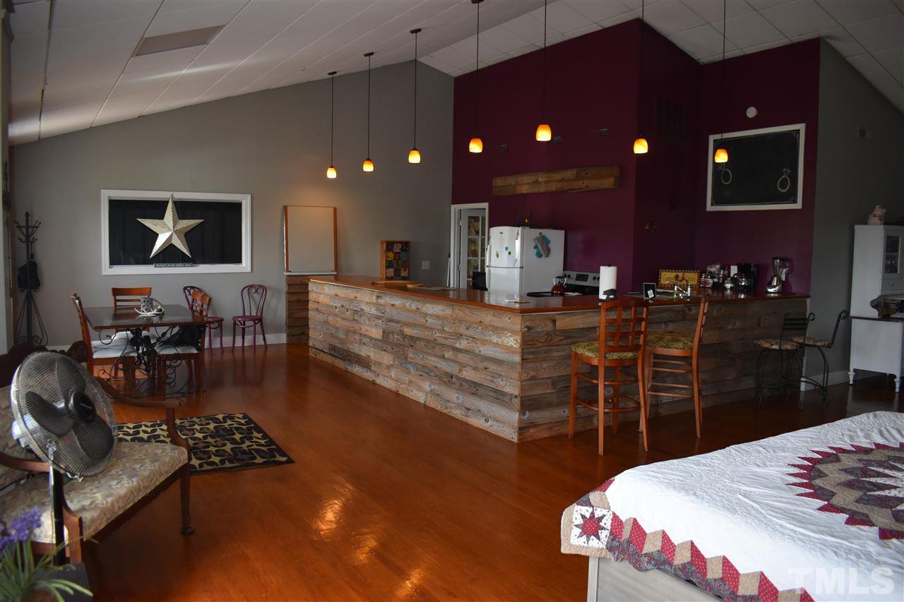 466 Vineyard Ridge Siler City, NC 27344 - Photo 12 of 29 a kitchen with granite countertop lots of counter top space