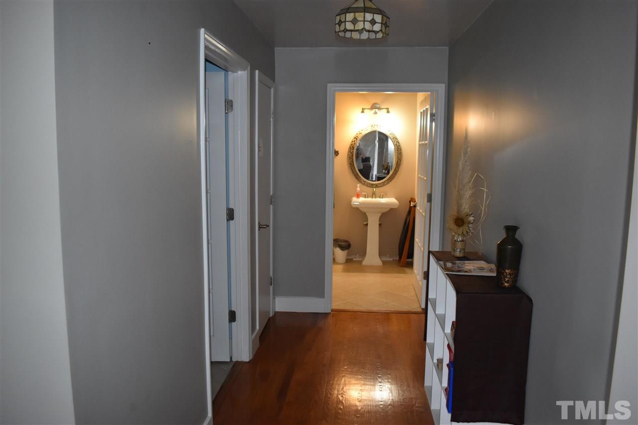 466 Vineyard Ridge Siler City, NC 27344 - Photo 18 of 29 a bedroom with a bed and a closet