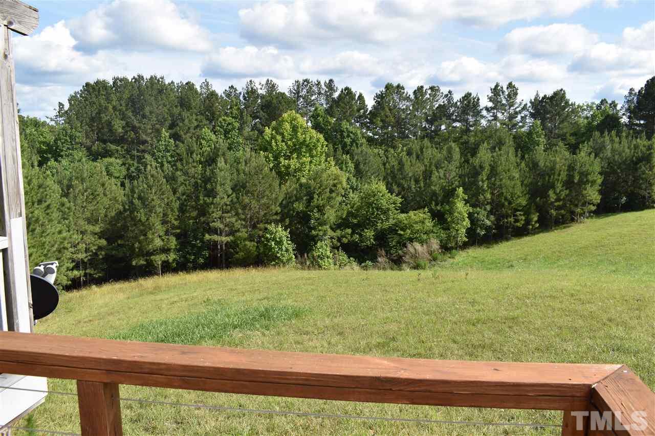 466 Vineyard Ridge Siler City, NC 27344 - Photo 25 of 29 a view of a yard with large trees