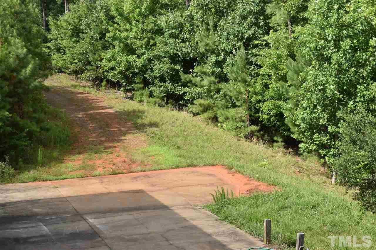 466 Vineyard Ridge Siler City, NC 27344 - Photo 28 of 29 a view of a yard with a tree