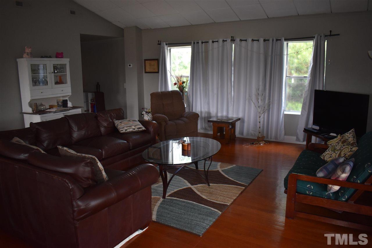 466 Vineyard Ridge Siler City, NC 27344 - Photo 7 of 29 a living room with furniture rug and window