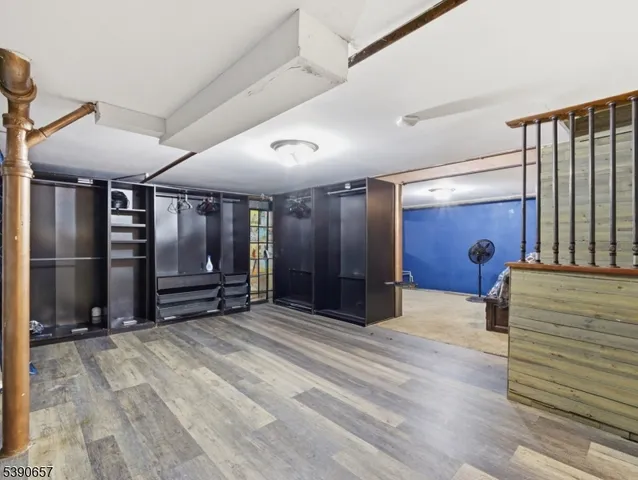 a view of a hallway with closet