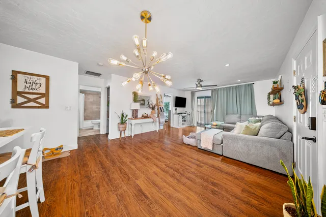 a room with furniture and a wooden floor