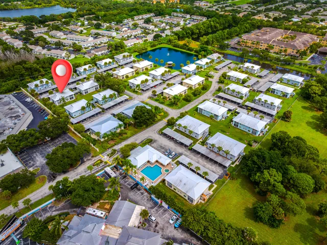 an aerial view of a houses with outdoor space