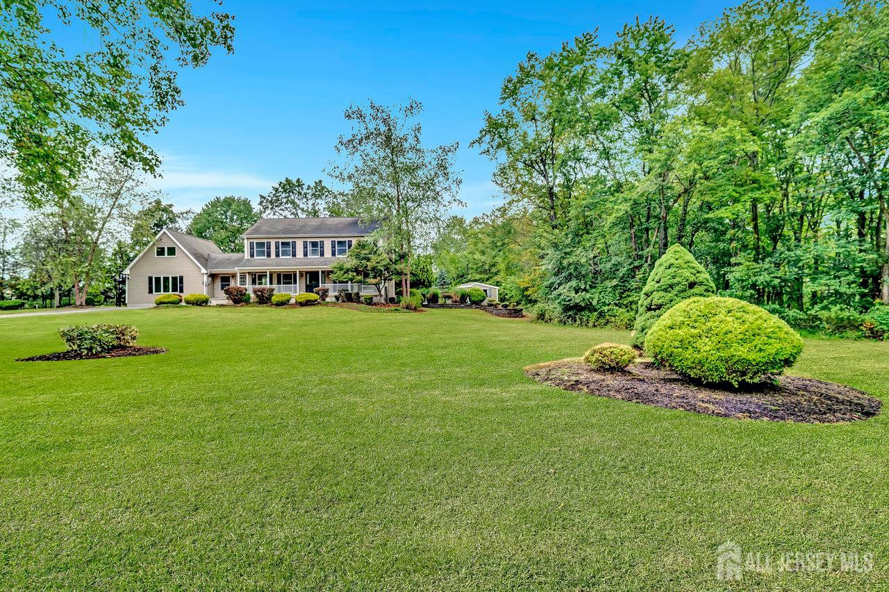 526 County Road, Unit 579 Ringoes, NJ 08551 - Photo 18 of 51 a view of an house with a big yard