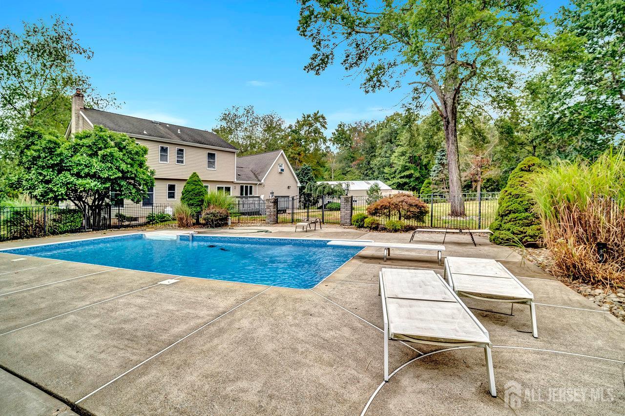 526 County Road, Unit 579 Ringoes, NJ 08551 - Photo 27 of 51 a view of outdoor space yard swimming pool and patio