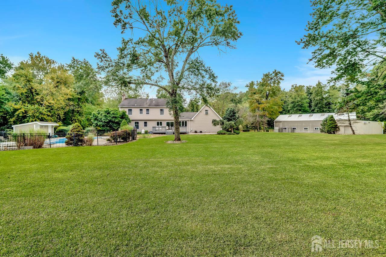 526 County Road, Unit 579 Ringoes, NJ 08551 - Photo 28 of 51 a view of a house with a big yard