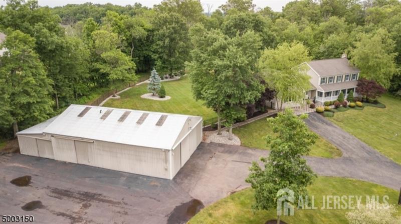 526 County Road, Unit 579 Ringoes, NJ 08551 - Photo 32 of 51 a view of a swimming pool with a patio