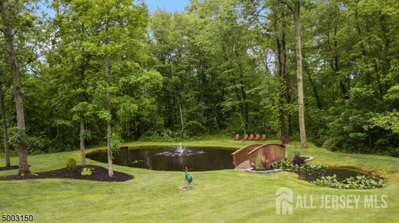 526 County Road, Unit 579 Ringoes, NJ 08551 - Photo 33 of 51 a view of a park with swings