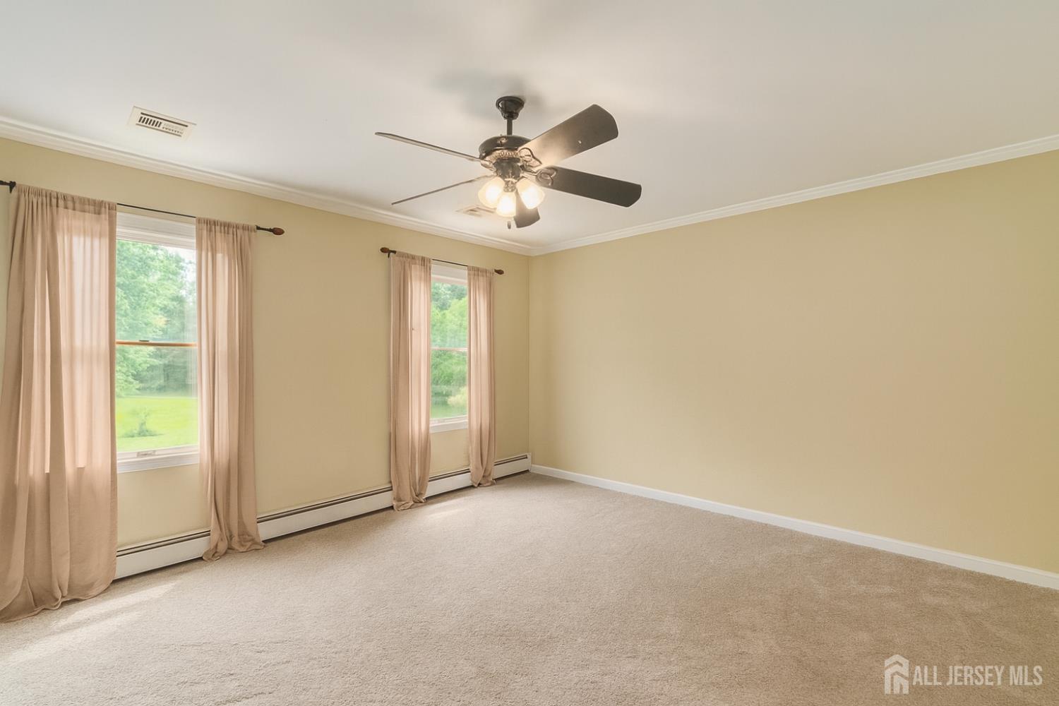 526 County Road, Unit 579 Ringoes, NJ 08551 - Photo 49 of 51 a view of an empty room with a window