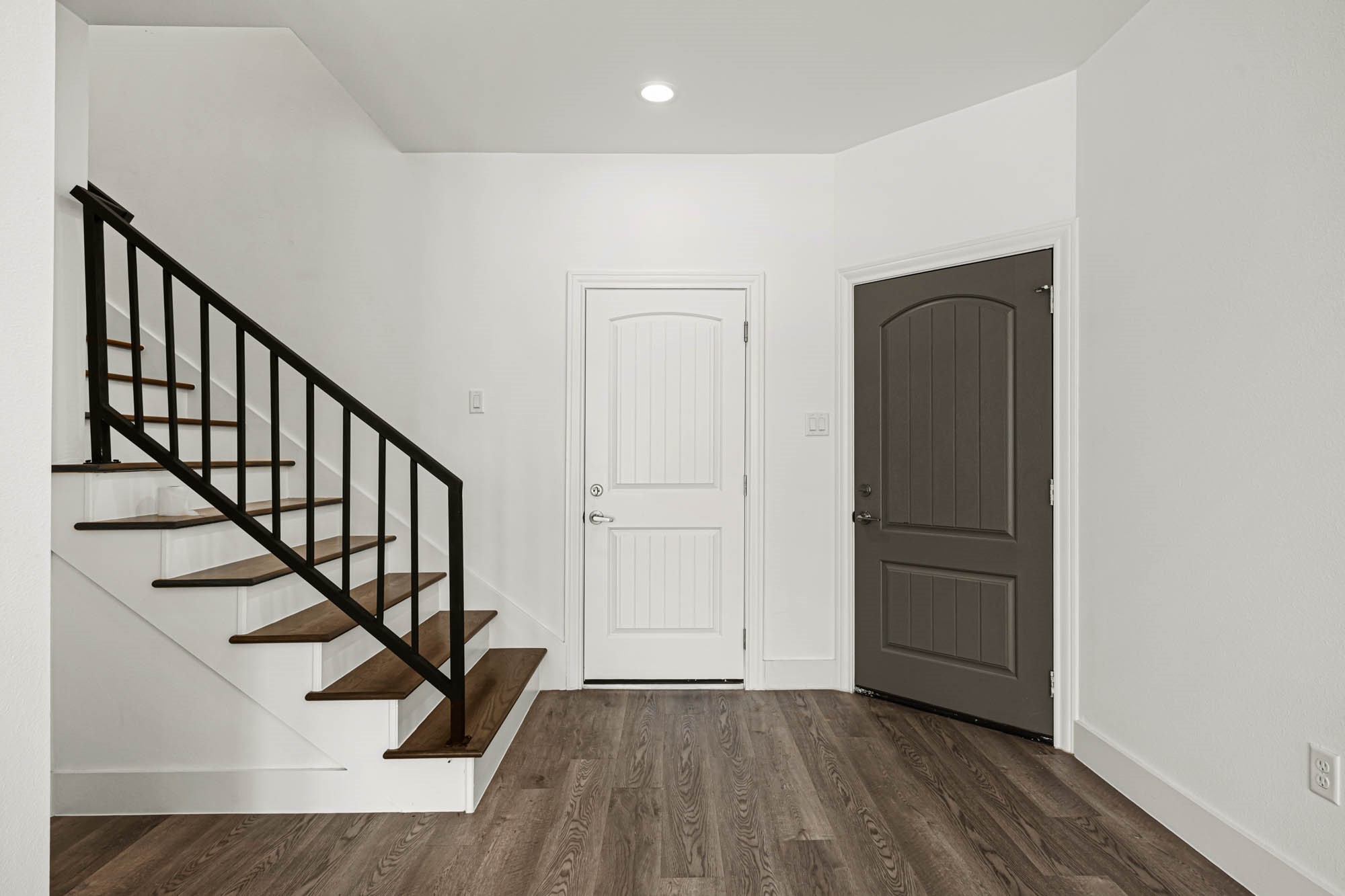 4512 Noble Street Houston, TX 77020 - Photo 10 of 16 a view of an entryway with wooden floor