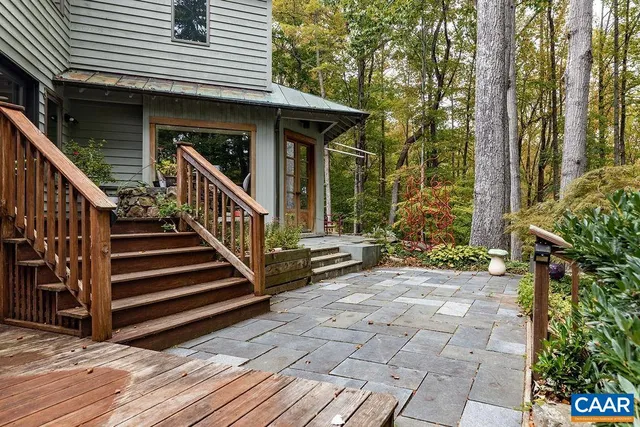 a view of sitting area with furniture and wooden floor