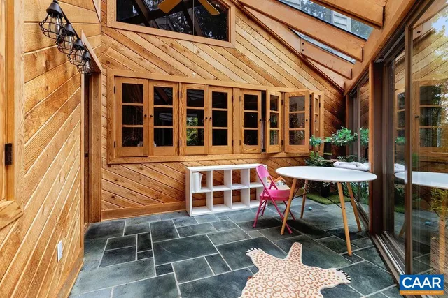 a bathroom with a toilet sink and shower