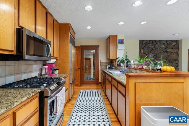 a view of balcony with wooden floor