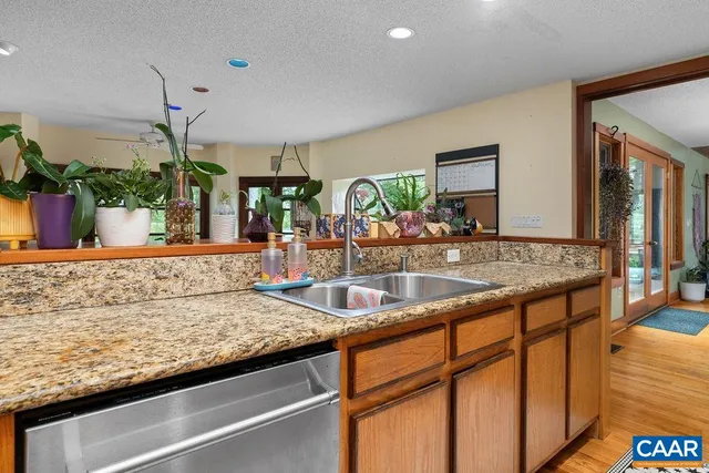 a bathroom with a glass shower door