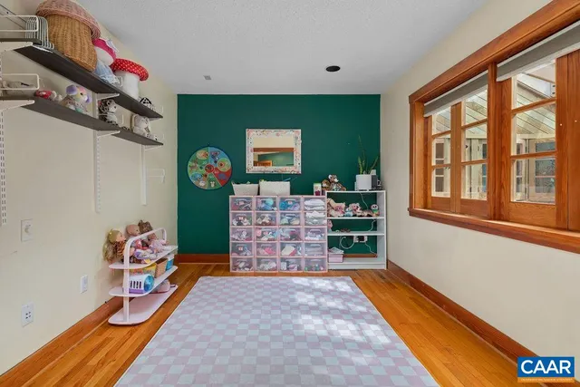 a bathroom with a sink a mirror and vanity