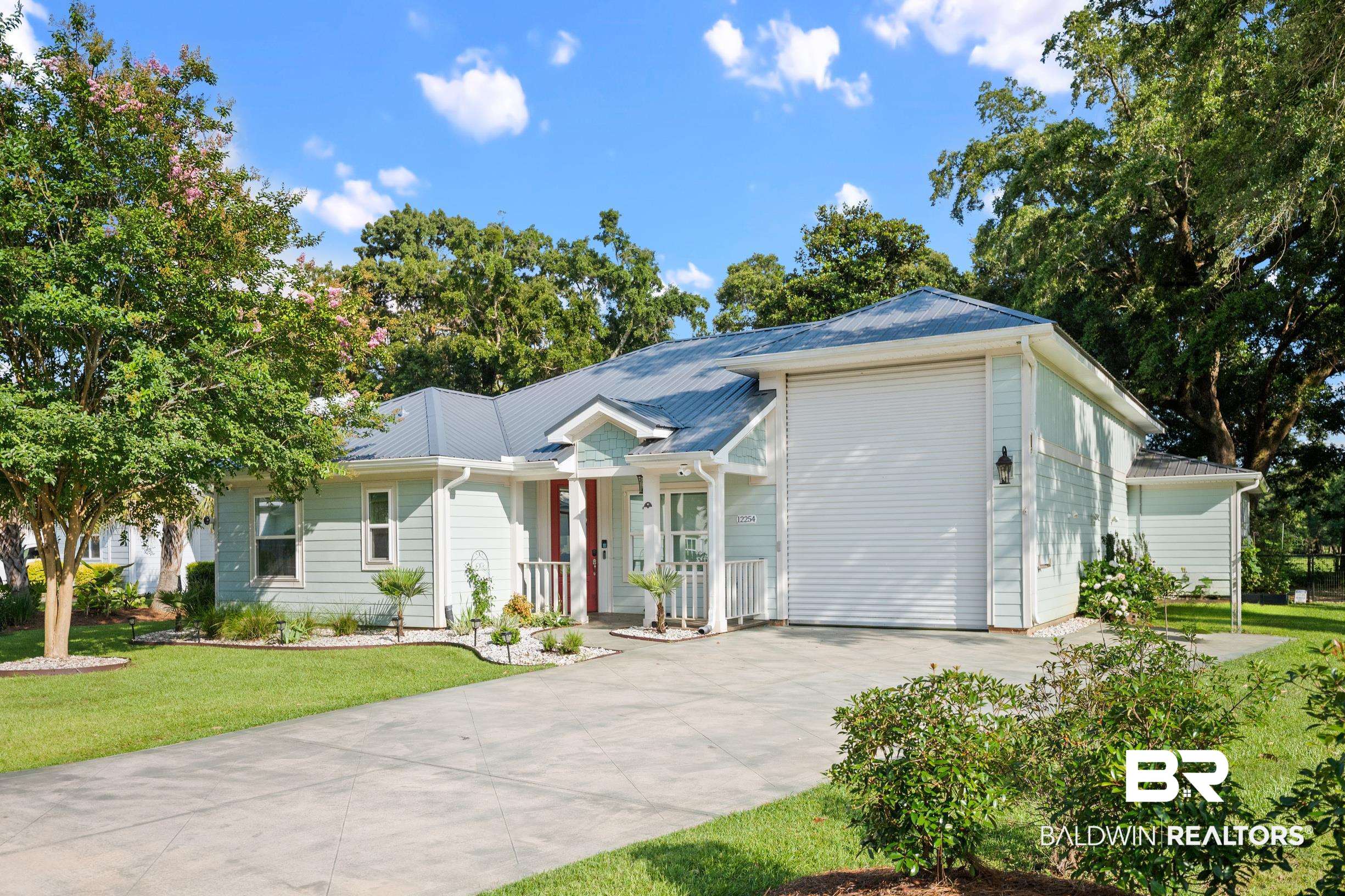 12254 Reunion Place Foley, AL 36535 - Photo 4 of 62 Single story home with a porch, driveway, and a front lawn